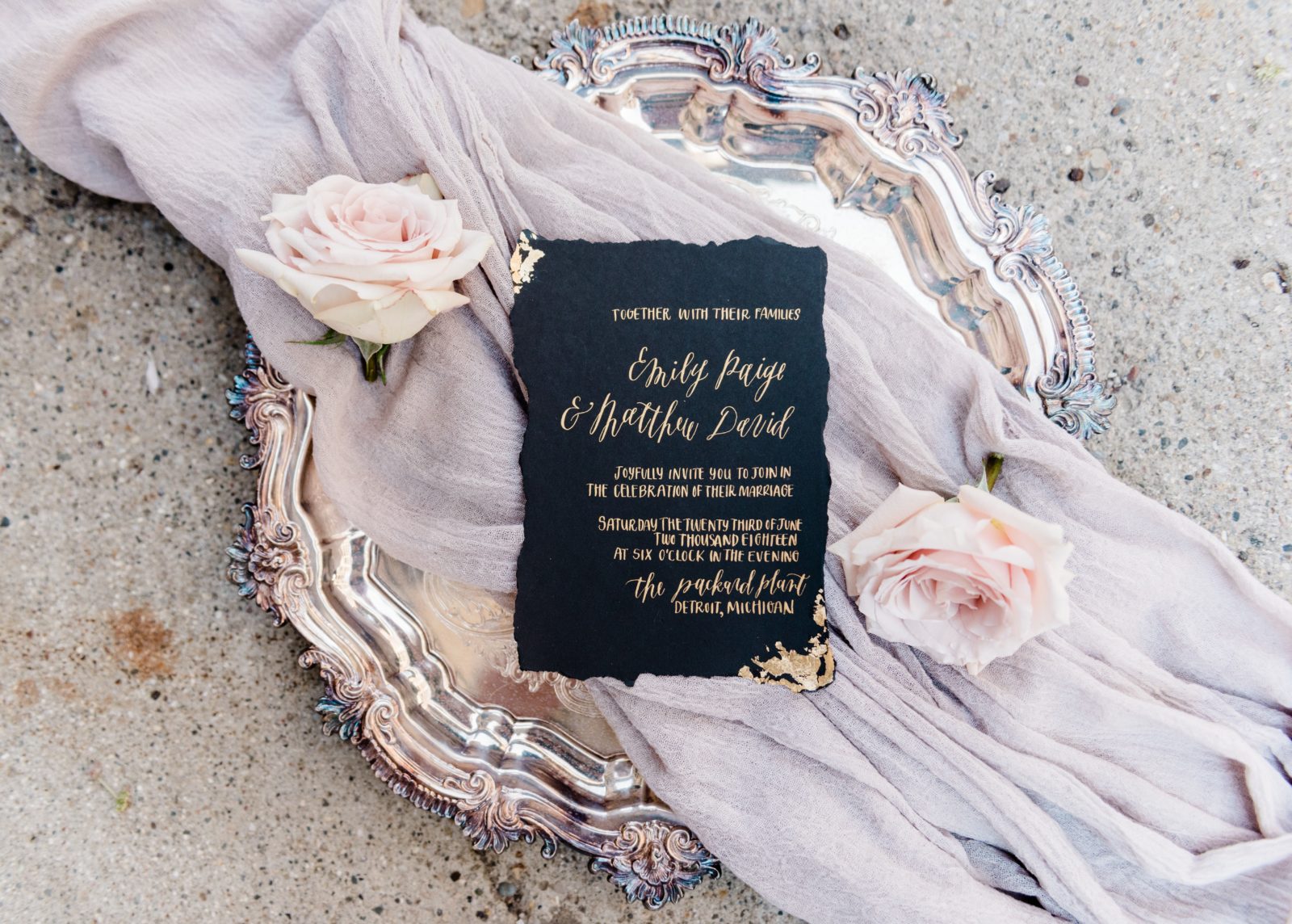 Oh Eleven Calligraphy | black invitation with metallic gold ink and gold foiled edges.